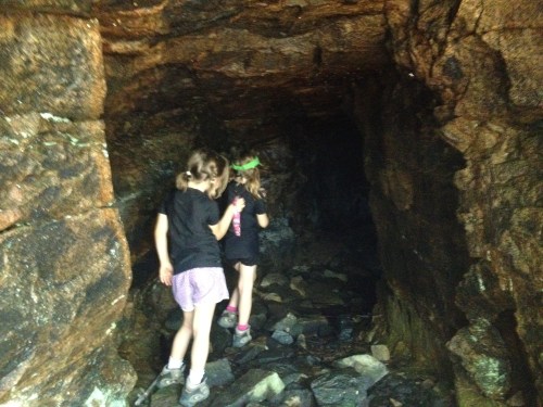 The girls explore the mine shaft